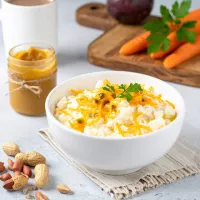 Owsianka z marchewką, marakują, ricottą i masłem orzechowym / Oatmeal with carrot, passionfruit, ricotta and peanut butter