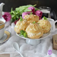 Ptysie z kremem śmietankowym i białą czekoladą