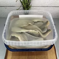 Śledzie w śmietanie