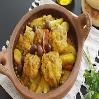 Tajine z kurczakiem i kalafiorem w marynacie Chermoula